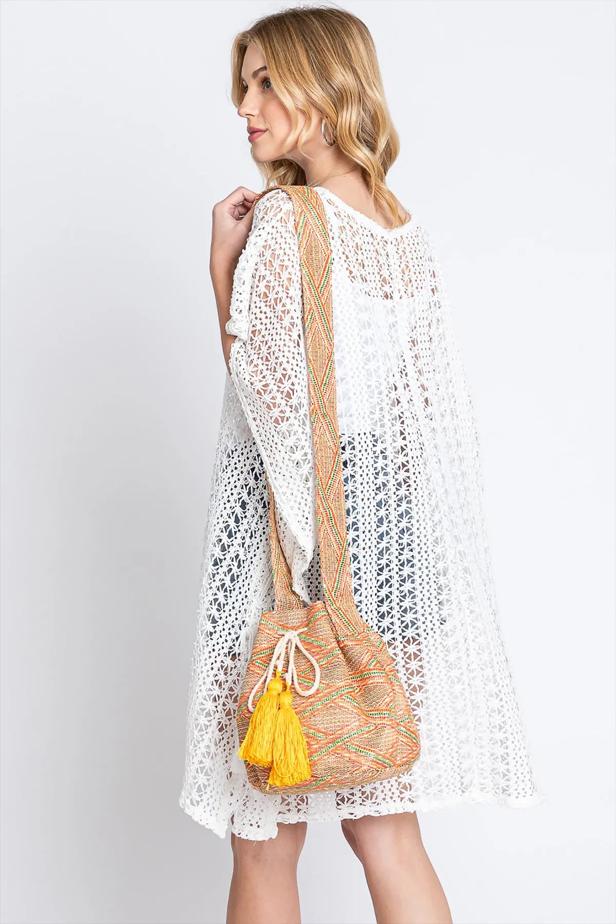 SOLID BUCKET BAG WITH AZTEC STRAP