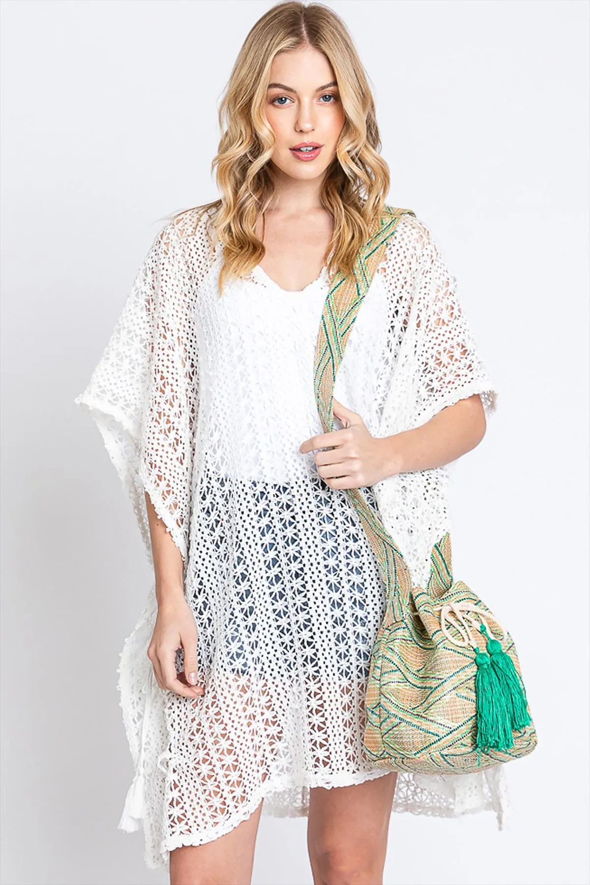 SOLID BUCKET BAG WITH AZTEC STRAP
